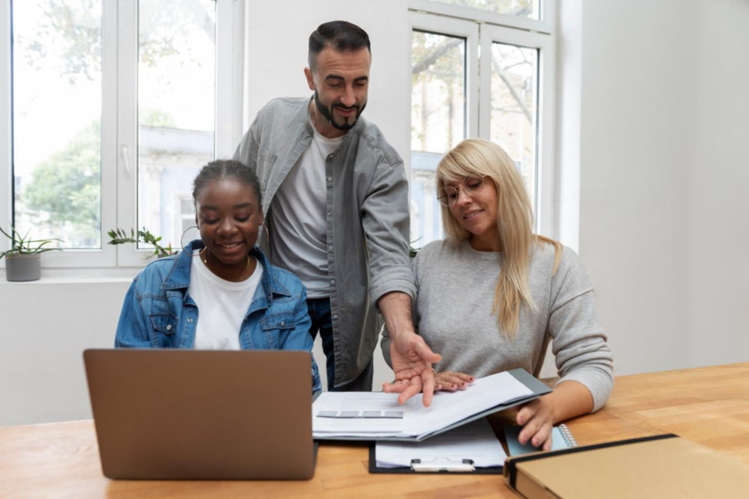 Financial planning workspace with budget analysis documents and digital tools